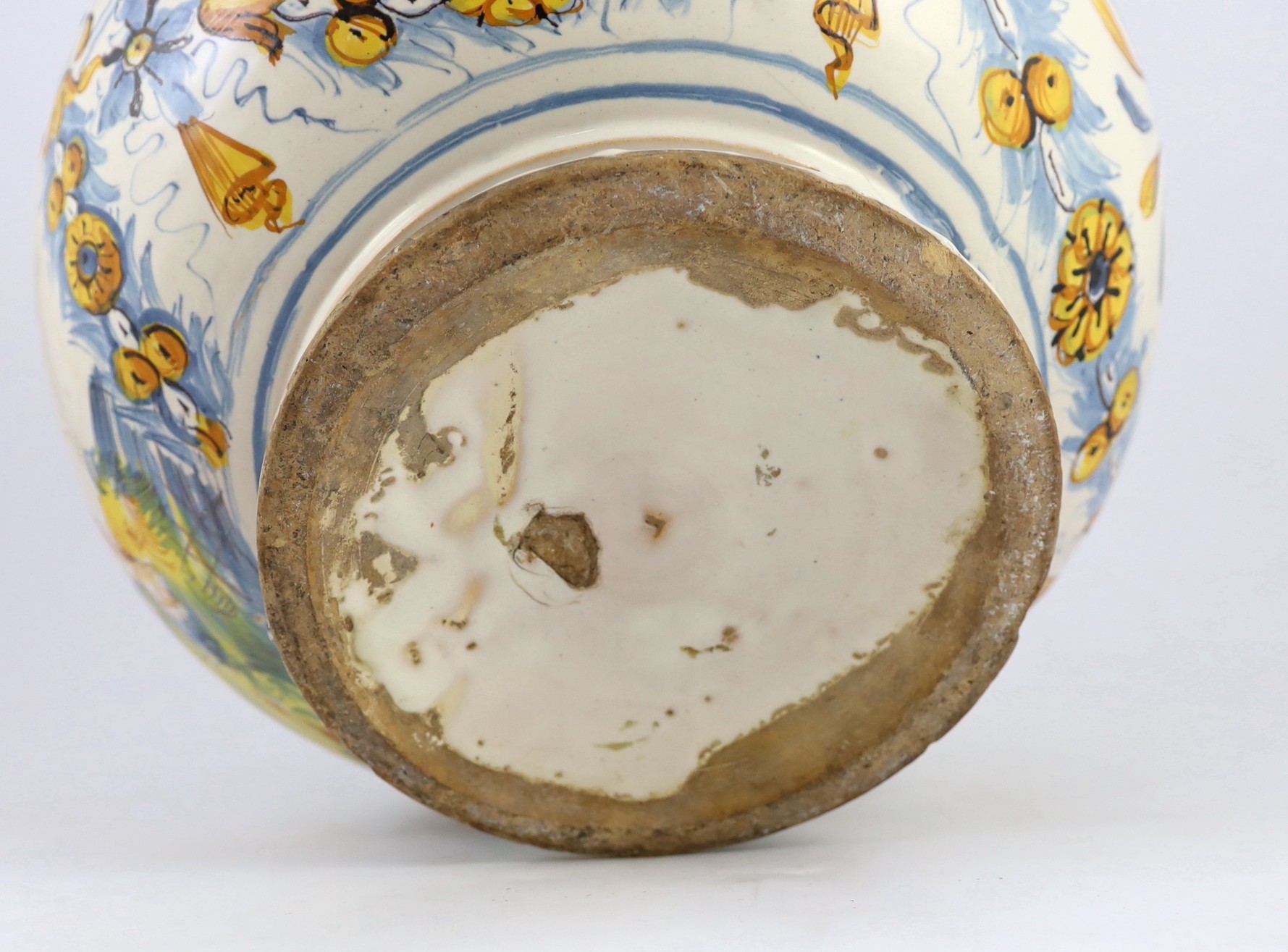 A large Italian maiolica bombola, 18th century, possibly Sicilian, 35cm diameter, 29.5cm high, some restoration, crack to base